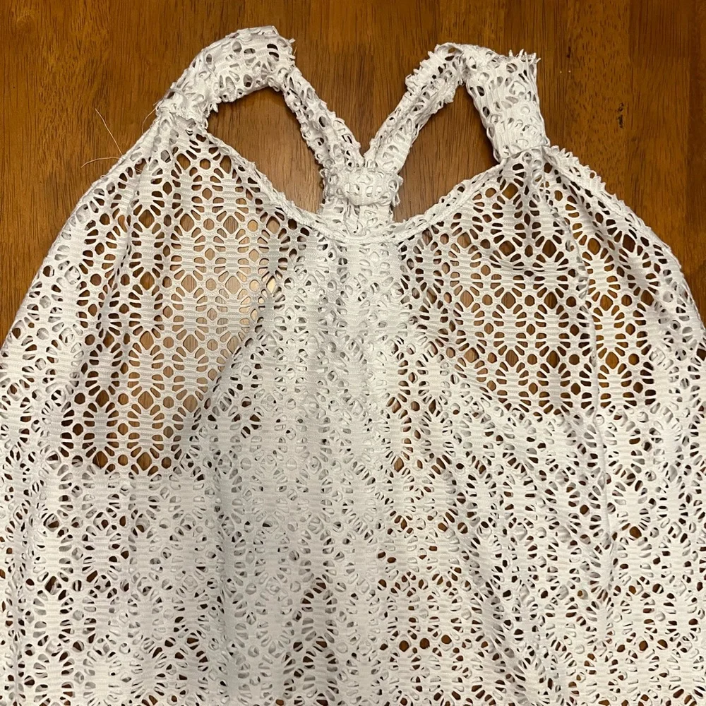 EUC swim coverup with adjustable straps and back. Excellent condition.